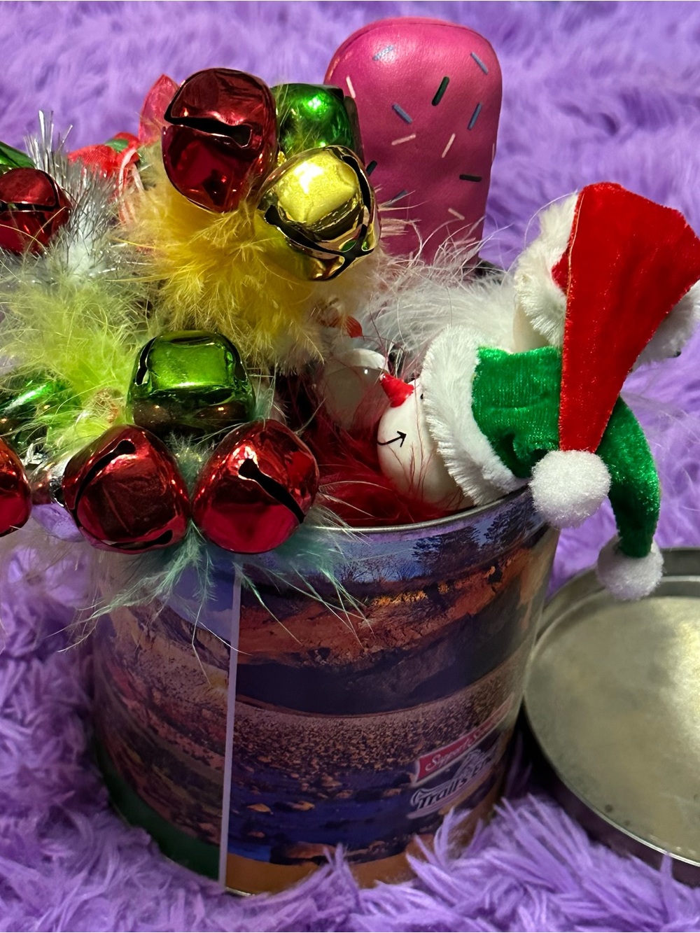 Several fun and festive pens w a Boy Scout popcorn tin to keep them in.